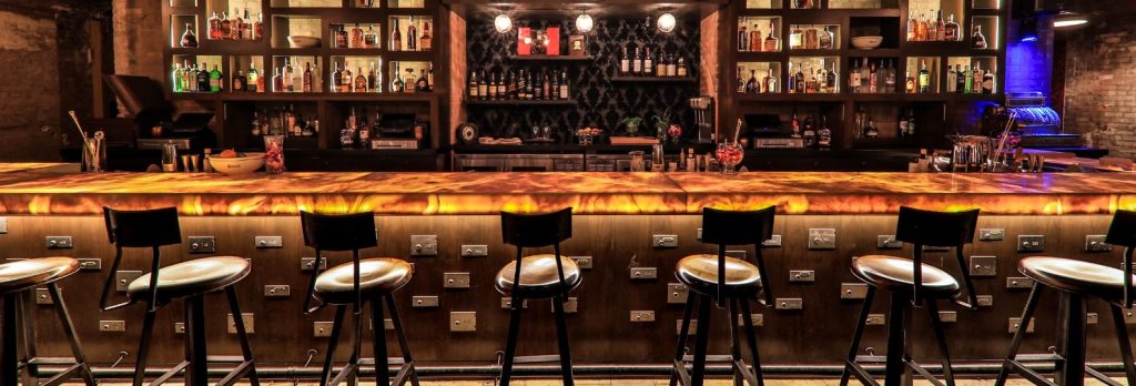 Backlit honey onyx bar installation at the Metropolitan Hotel using Nu World LED panels