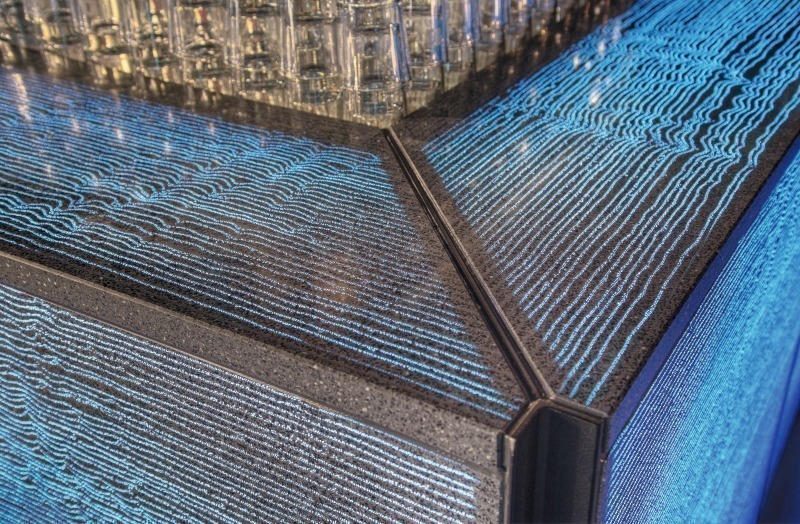Translucent concrete panel illuminated from within, with visible fiber texture