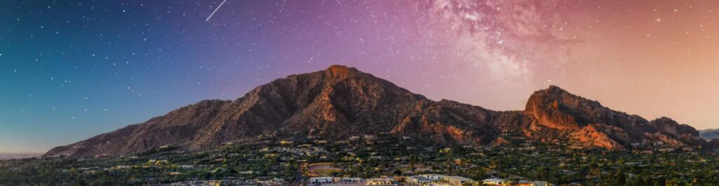 Camelback Mountain and Phoenix skyline at sunset